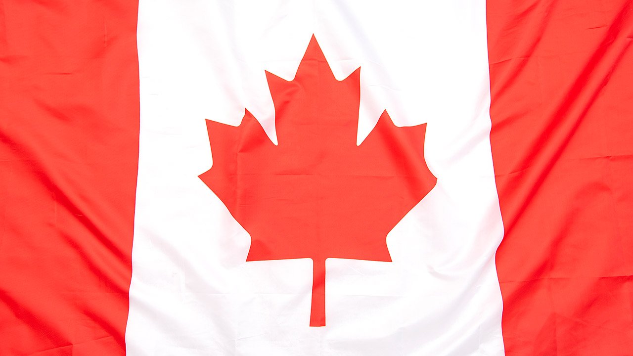 real-fabric-flag-canada-as-background-texture-top-view-canadian-flag.jpg